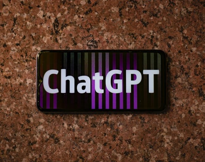 ChatGPT on a phone screen, representing AI search optimisation work.
