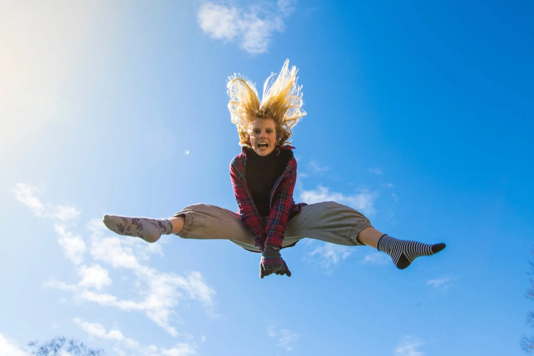 A Position Digital team member leaping for joy.