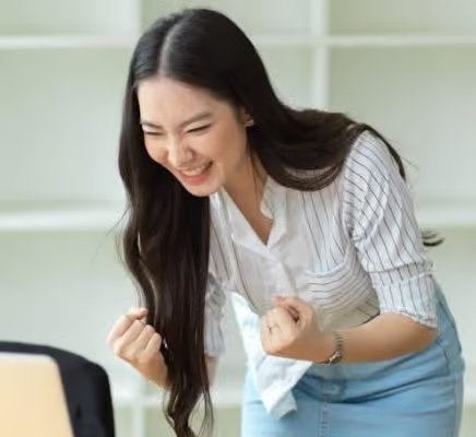 Recruiter looking at a screen happy with SEO results