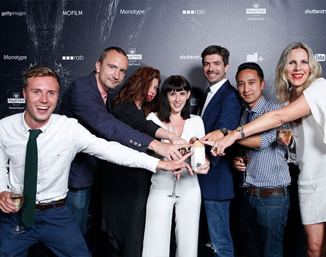 Group celebrating at a Don't Panic digital PR event.