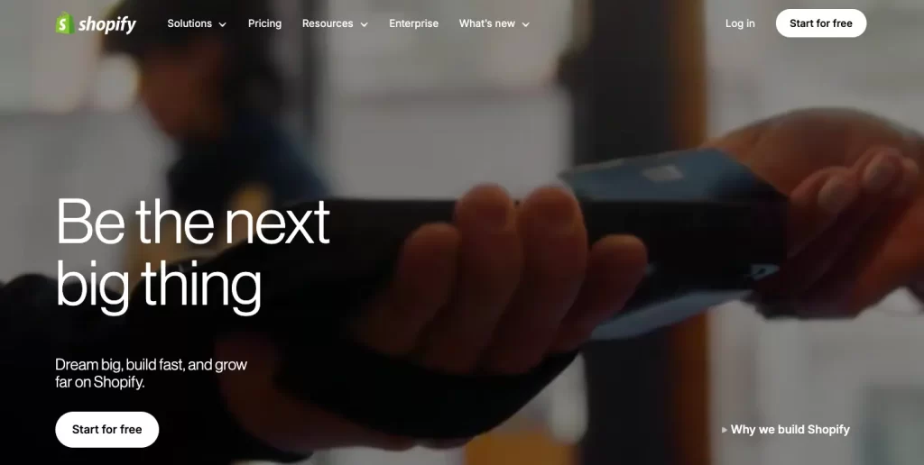 Hands holding a device, symbolizing growth with an SEO agency for startups, AI SEO company, and B2B SaaS SEO services.