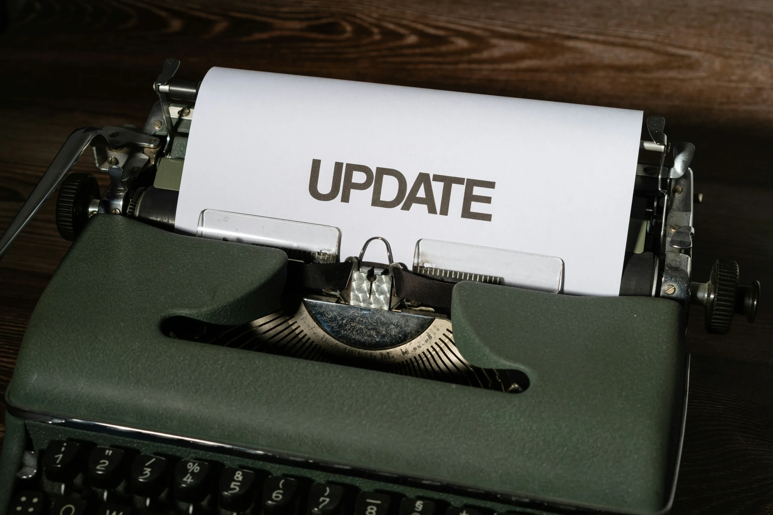 A typewriter with a letter that says "update."
