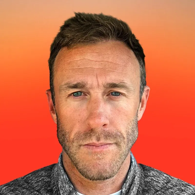 The headshot of Joshua Ritchie.